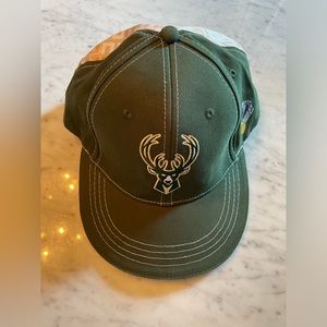 Milwaukee Bucks Kris Middleton designed cap series seat giveaway.
